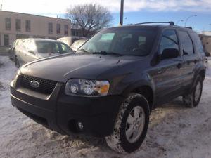  FORD ESCAPE...VERY CLEAN... 4X4... 7 MONTH WARRANTY