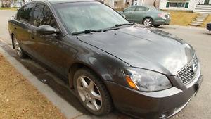 Nissan Altima!!Reliable and very cheap