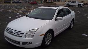  Ford Fusion leather loaded sunroof 1 year free warranty