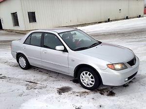 Wanted: Mazda Protege  - Low Mileage