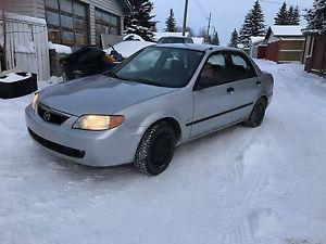 Clean  Mazda Protege *FREE SET OF TIRES ON RIMS WITH