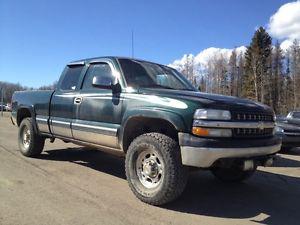 $ Chevrolet Silverado  Quad Cab with tow pack.