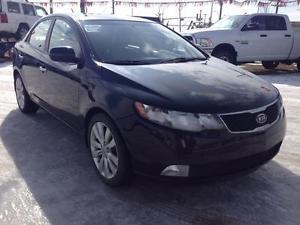  Kia Forte...SX,LEATHER,MOON ROOF... B/W WOW